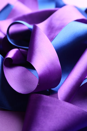Beautiful violet and blue ribbons as background, closeupの写真素材
