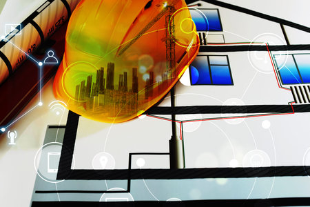 Engineering concept. Multiple exposure of construction drawings,hard hat with building site and iconsの写真素材