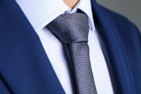 Man in suit with stylish necktie, closeupの写真素材