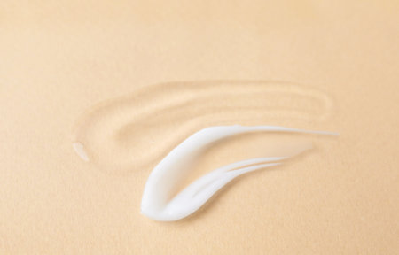 Samples of cosmetic products on beige background, closeupの写真素材