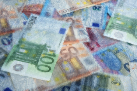 Money frozen. Many euro bills under iceの写真素材