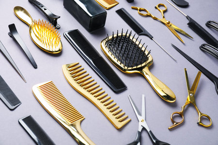Different hair styling tools on gray background, closeupの写真素材