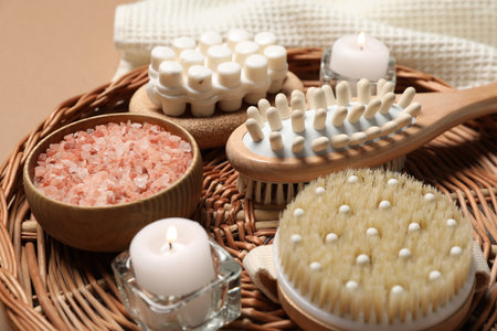 Beautiful composition with spa essentials on brown background, closeupの写真素材