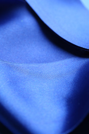 Beautiful blue ribbons as background, closeup view