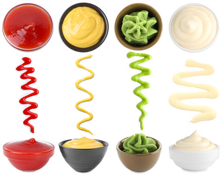 Mustard, ketchup, mayonnaise and wasabi isolated on white, collageの写真素材