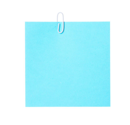 Blank paper note with clip isolated on whiteの写真素材