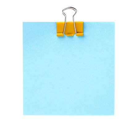 Blank paper note with blinder clip isolated on whiteの写真素材