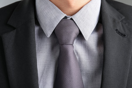 Man in suit with stylish necktie, closeupの写真素材