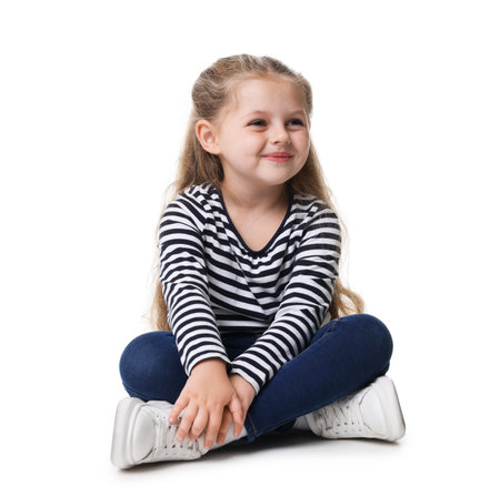 Cute little girl posing on white backgroundの写真素材