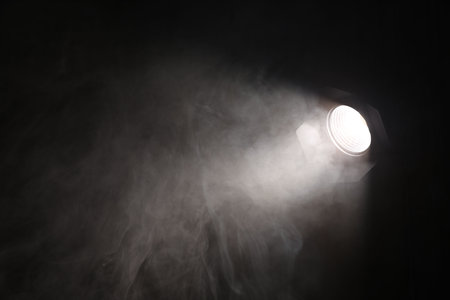 Professional lighting equipment on dark background. Space for textの写真素材