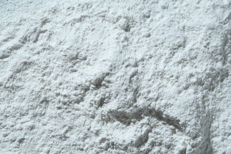 Texture of dry talcum powder as background, top viewの写真素材