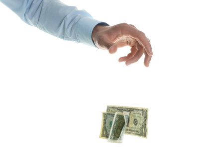 Man throwing money on white background, closeup