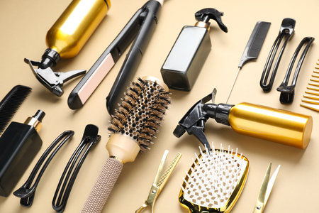 Different hair styling tools on beige background, closeupの写真素材