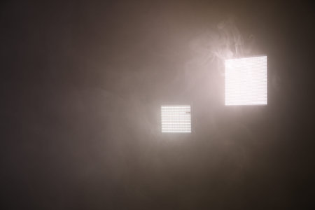 Professional lighting equipment on dark background. Space for text