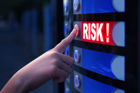 Person pressing glowing red button, closeup