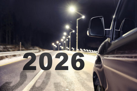 Car riding towards numbers on roadの写真素材