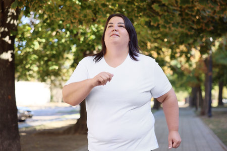 Woman running in park. Healthy lifestyle