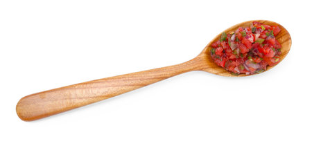 Tasty salsa sauce in spoon isolated on white, top viewの写真素材