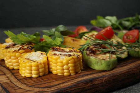 Vegetarian barbeque. Tasty grilled vegetables served on gray table, closeupの写真素材