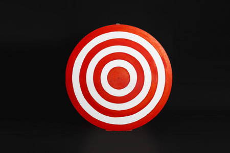 One round shooting target on black backgroundの写真素材