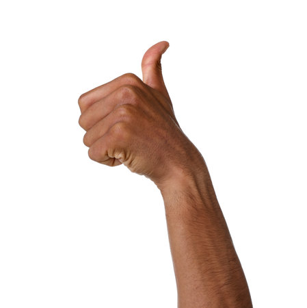 African-American man showing thumbs up on white background, closeupの写真素材