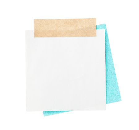 Blank paper notes with adhesive tape isolated on whiteの写真素材