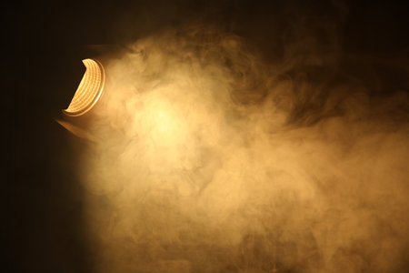 Professional lighting equipment without reflector on dark background. Space for textの写真素材