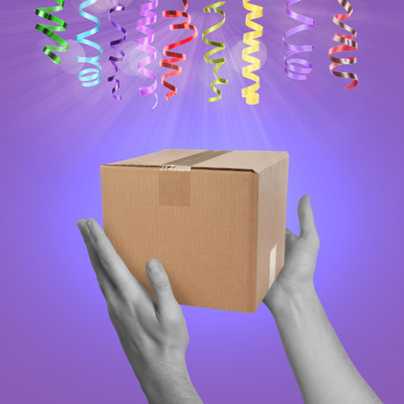 Holiday delivery, creative poster. Gift box in male hands under falling streamers on purple gradient backgroundの写真素材