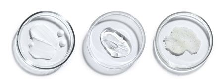 Petri dishes with cosmetic products on white background, top viewの写真素材