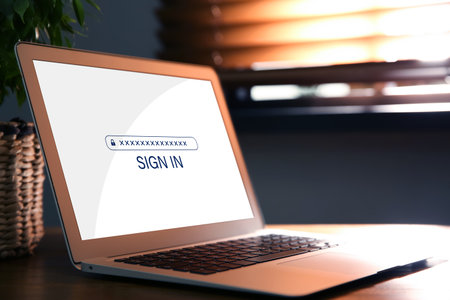 Computer on desk in roomの写真素材