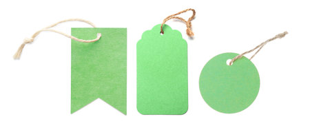 Green tags of different shapes isolated on white, set. Top viewの写真素材