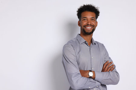 Portrait of handsome man on white background, space for textの写真素材