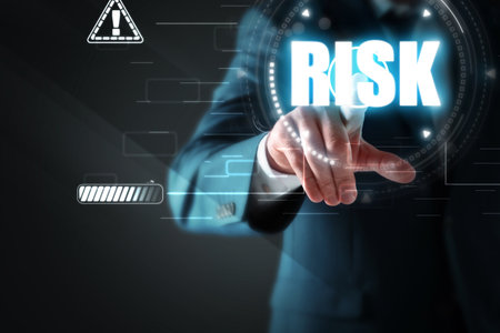 Businessman touching the word Risk on virtual screen, closeupの写真素材