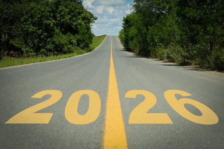 Yellow written numbers on asphalt road