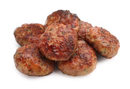Delicious roasted meat patties isolated on white