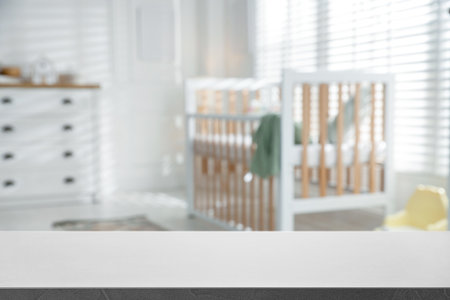 Empty table in baby room. Space for designの写真素材