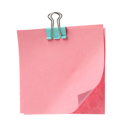 Blank paper notes attached with blinder clip isolated on whiteの写真素材