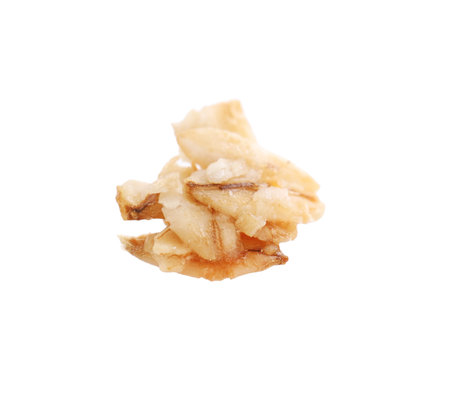 Delicious granola in air against white background