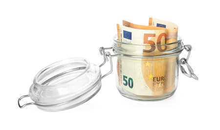 Jar with euro banknote isolated on white. Money savingsの写真素材