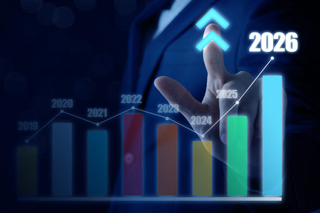 Businessman using virtual screen with graph and numbers of years from 2019 to 2026 against dark blue...