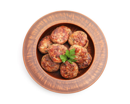 Meat patties with parsley isolated on white, top viewの写真素材