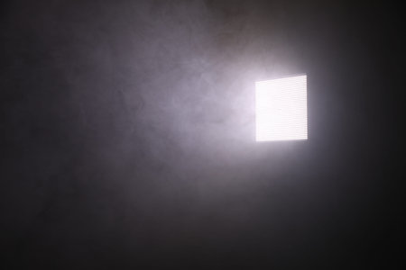 Professional lighting equipment without reflector and smoke on dark background. Space for text