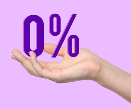 Woman holding 0 percent sign against lilac background, closeup. Zero commissionの写真素材