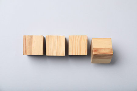 Wooden cubes on light background, top viewの写真素材