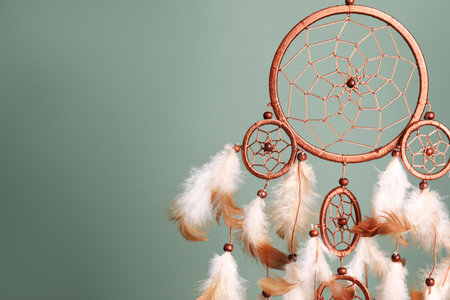 Beautiful dream catcher on color background. Space for textの写真素材