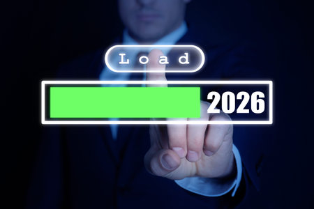 Businessman pressing Load button above bar with 2026 numbers against dark background, closeup. Ready...