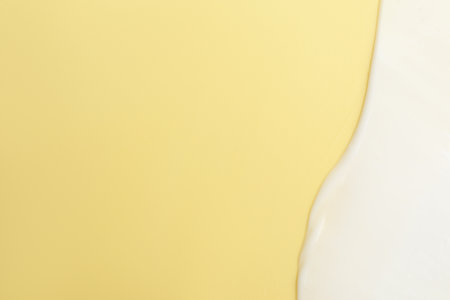 Sample of cosmetic product on beige background, top view. Space for textの写真素材