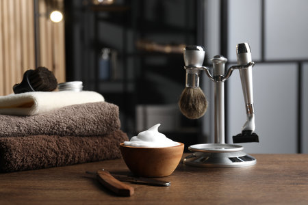 Barber's tools on wooden table in barbershop, closeupの写真素材