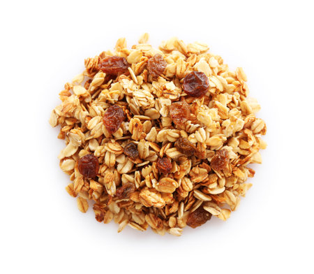 Pile of tasty granola with dried fruits isolated on white, top viewの写真素材