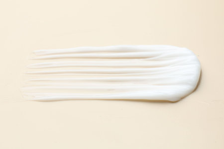 Sample of moisturizing cream on beige background, closeupの写真素材